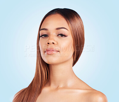 Buy stock photo Makeup, beauty and portrait of black woman in studio for skincare, grooming and glamour on blue background. Face, cosmetic and girl model relax with luxury, wellness and natural glowing skin isolated