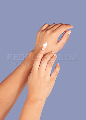 Buy stock photo Hands, skincare and cream cosmetics in studio isolated on a purple background for hydration. Product, dermatology and woman or female model with lotion, creme or moisturizer   for beauty aesthetics.