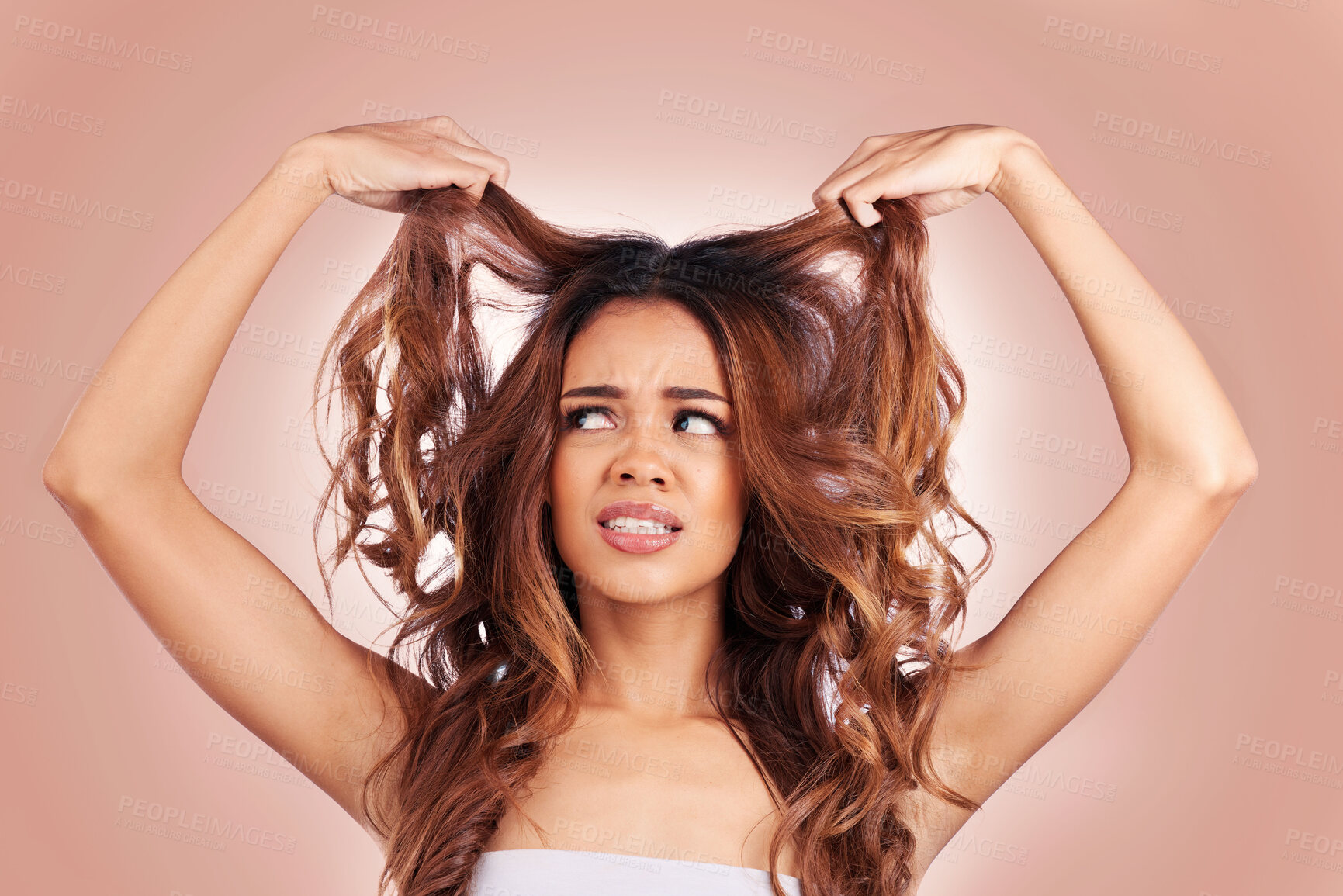 Buy stock photo Sad, beauty and hair loss of woman in studio isolated on a pink background for haircare. Hairstyle, face and confused female model with keratin problem, split ends and damage after salon treatment.