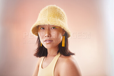 Buy stock photo Asian woman, fashion and cosmetics with gen z and portrait, yellow aesthetic and edgy on studio background. Streetwear, beauty and makeup with style, female face and mockup space with fog or smoke