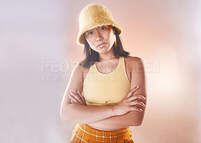 Buy stock photo Arms crossed, fashion and portrait of an Asian woman with style isolated on a studio background. Trendy, funky and confident Japanese model with empowerment, expression and edgy on a backdrop