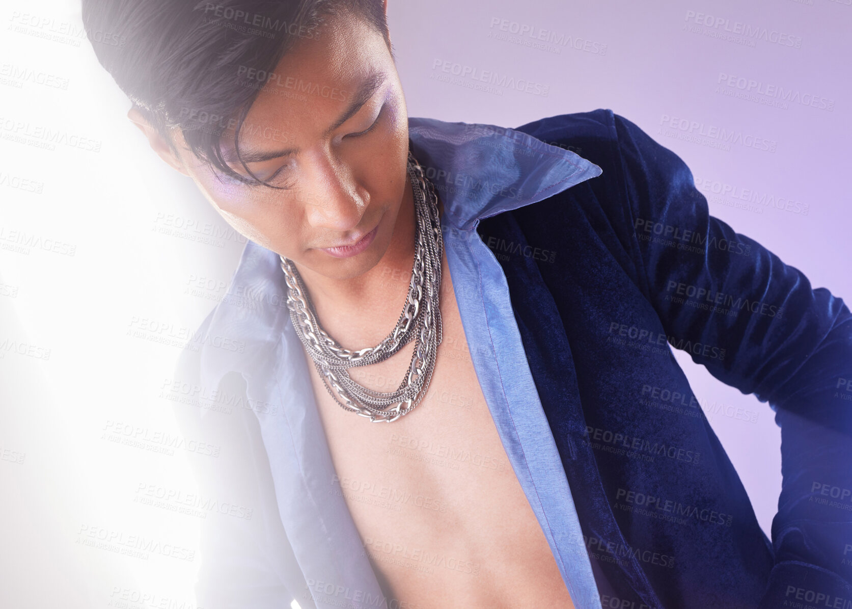 Buy stock photo Stylish, edgy and cyberpunk man with fashion isolated on a purple studio background. Creative, futuristic and serious Asian guy with expression through clothes, style and fashionable on a backdrop