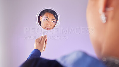 Buy stock photo Makeup, reflection and gay man with mirror in hand with pride on purple background. Cosmetics, aesthetic and art, lgbt fashion model face with beauty in studio, non binary and gender neutral skincare