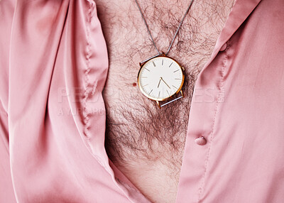 Buy stock photo Watch, jewelry and fashion with a man model closeup in an open shirt showing his chest hair for 70s style. Jewellery, lgbt and necklace with a gay male posing for edgy, trendy or contemporary style