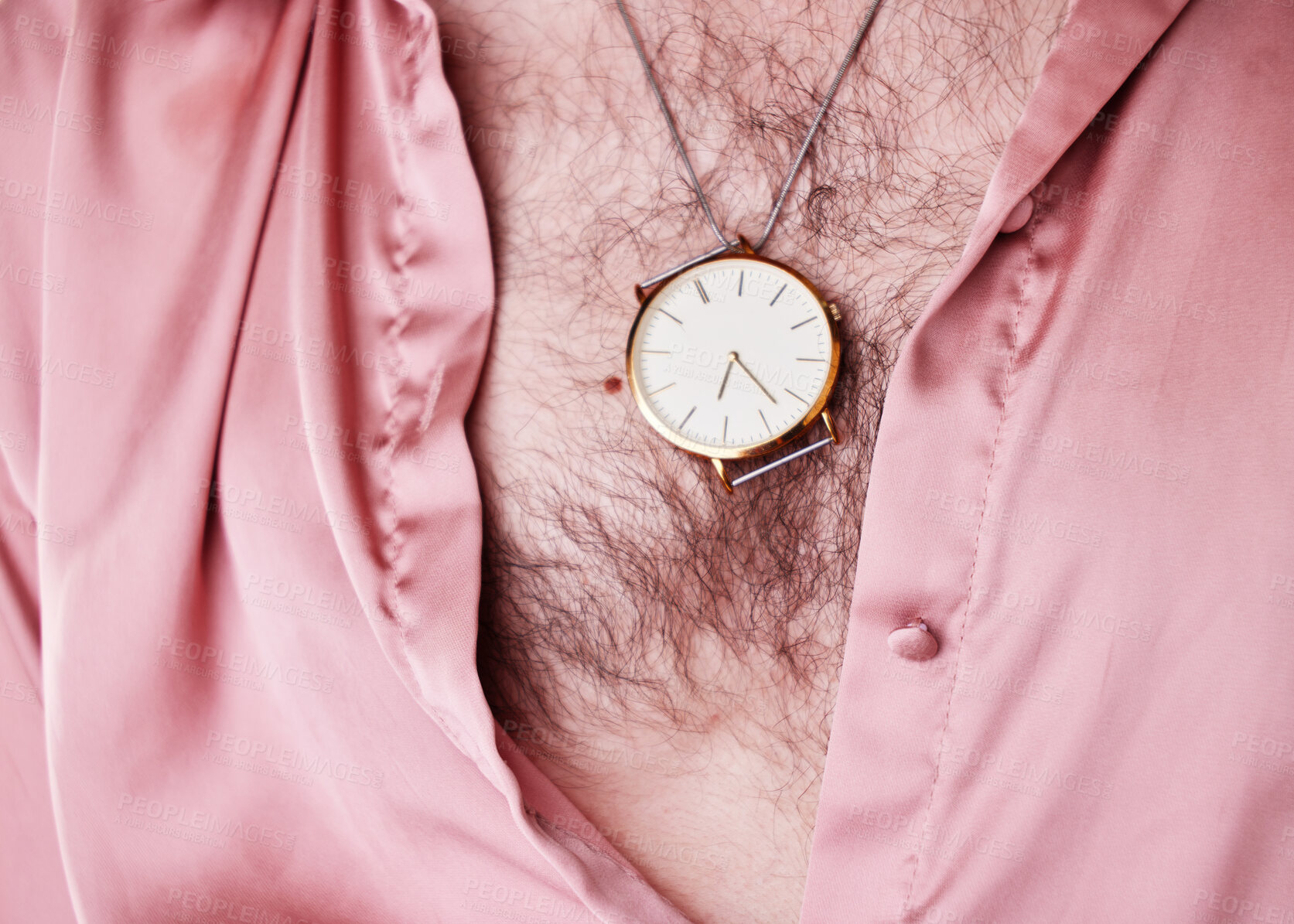 Buy stock photo Watch, jewelry and fashion with a man model closeup in an open shirt showing his chest hair for 70s style. Jewellery, lgbt and necklace with a gay male posing for edgy, trendy or contemporary style