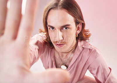 Buy stock photo Vintage man, fashion selfie and studio portrait for 70s, hippy or psychedelic aesthetic by pink background. Gen z model, retro clothes or profile picture on social network app for creative influencer