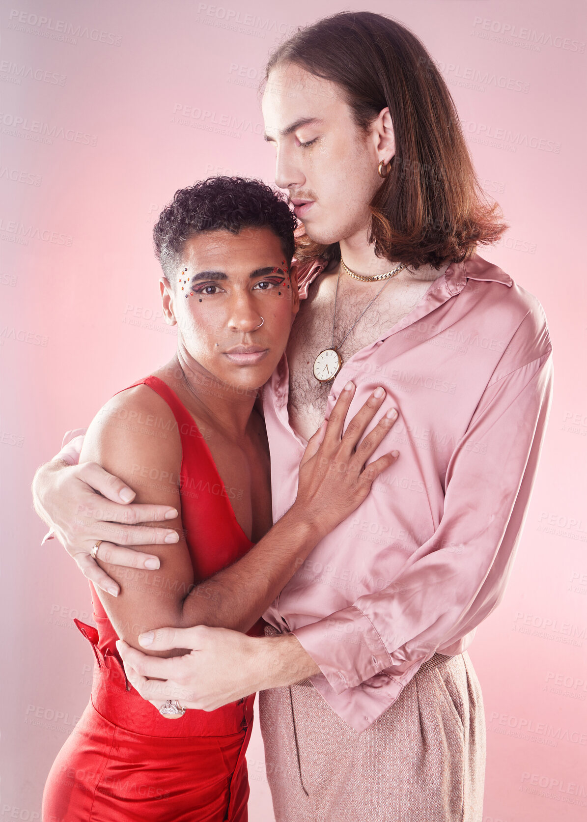 Buy stock photo Gay, portrait and people hug isolated on pink background in beauty glow, pastel and creative art aesthetic. Fashion, diversity and love, queer and transgender couple of friends in makeup or cosmetics