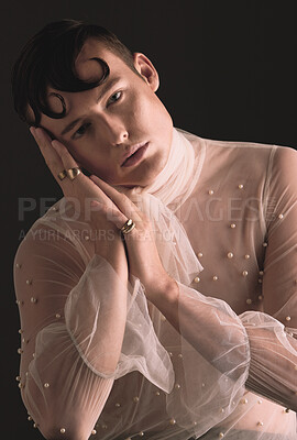 Buy stock photo Gender neutral, vintage fashion and portrait of person with designer clothing and faux pearls in studio. Isolated, black background and lgbtq or gay model with jewelry and creativity and non binary 