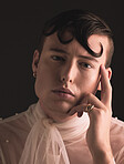 Queer, beauty portrait and man isolated on dark background for fashion, creative vision and elegant transgender or cross dressing. UK model or person face for lgbtq, cosmetics and makeup in studio