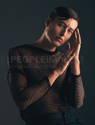 Buy stock photo Gender neutral, face and fashion, portrait on dark background and trendy, edgy with hands. Creative, gen z and beauty, sexy and cosmetics with serious non binary person in designer clothes