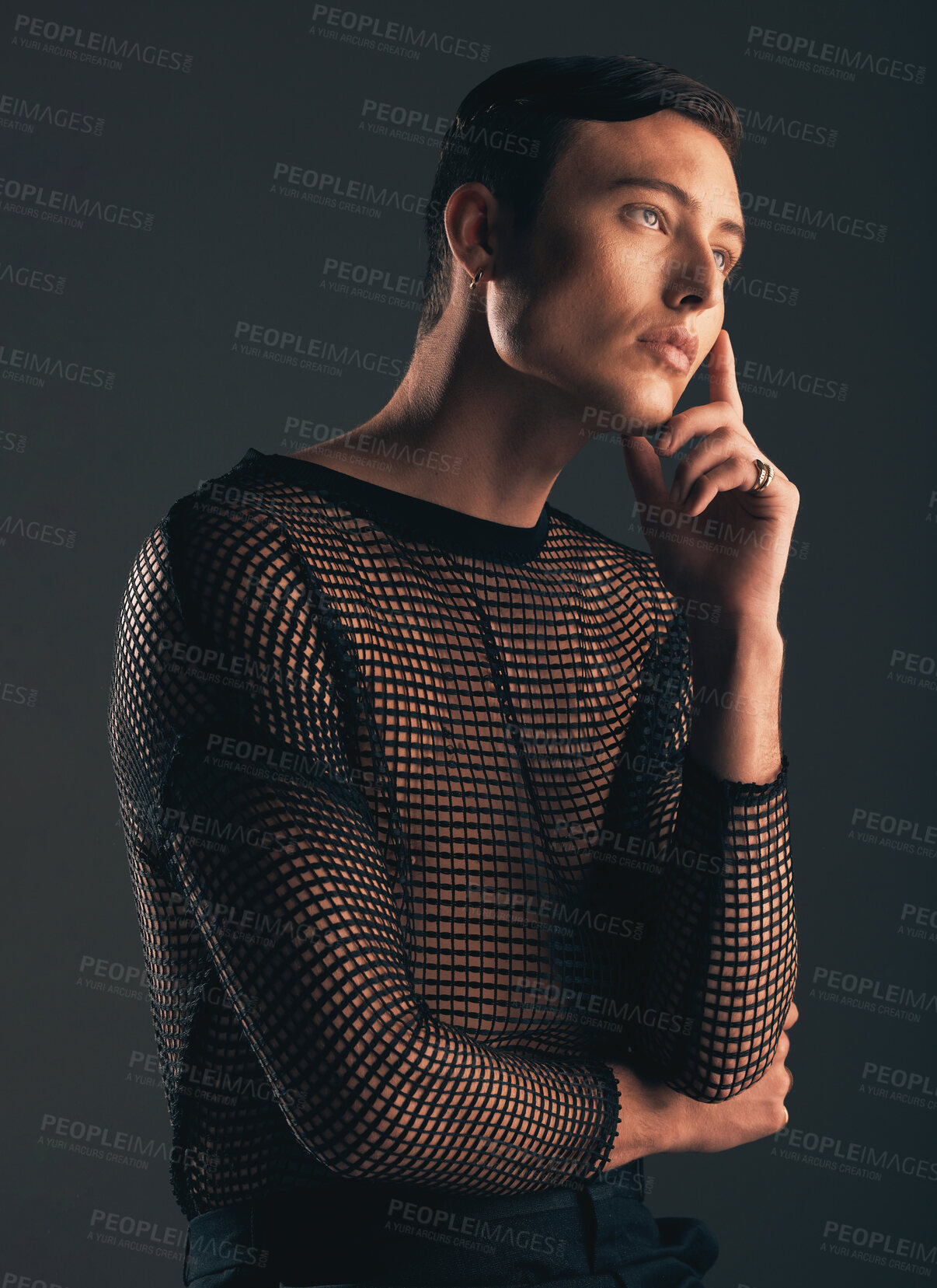 Buy stock photo Gender neutral person, fashion and thinking on dark background, trendy and edgy art. Creative, gen z and beauty, queer and sexy with cosmetics, contemplating with non binary and designer clothes