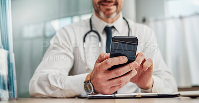 Buy stock photo Healthcare, hospital and hands of doctor with phone for social media, research and online consulting. Communication, insurance and man with smartphone for wellness app, medical data and telehealth