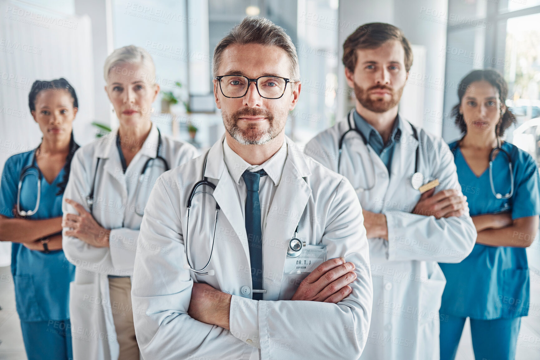 Buy stock photo Healthcare, leadership and team portrait of doctor and nurses in hospital with support and serious teamwork. Health, help and medicine confident doctors and professional medical employees together