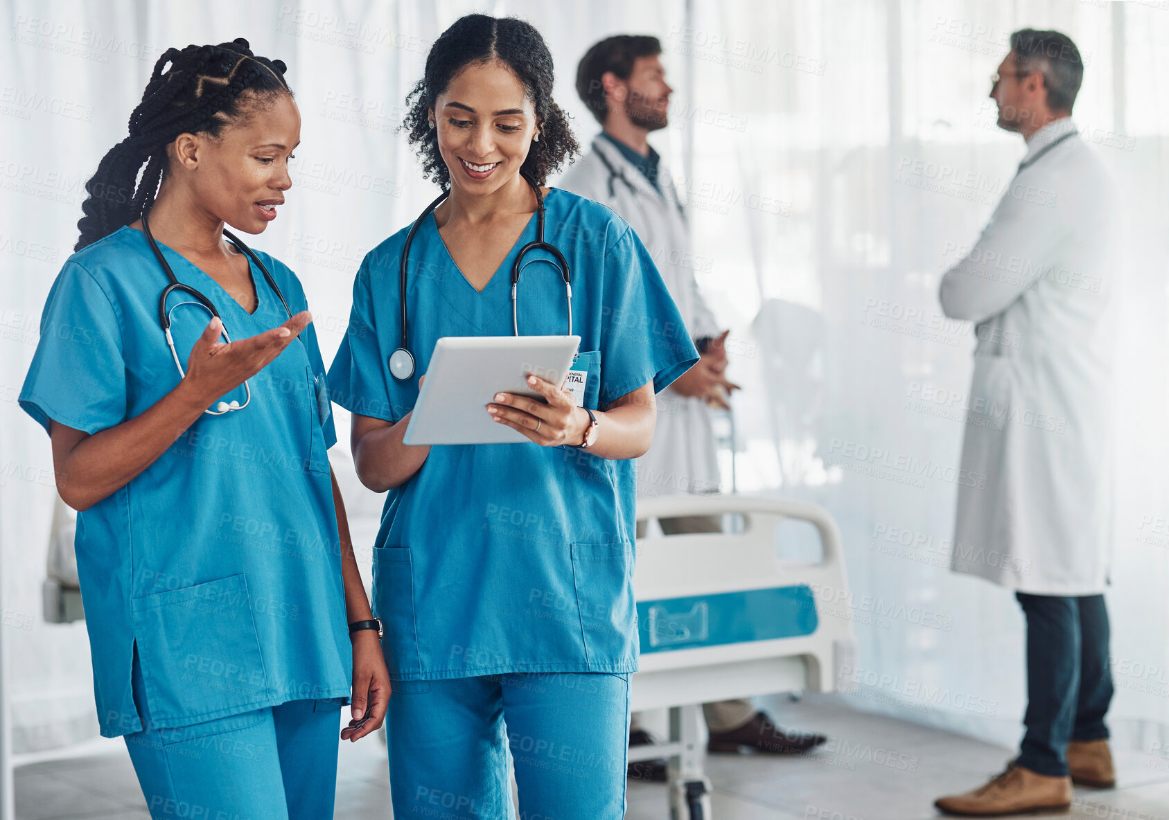 Buy stock photo Tablet, medical and female doctors in the hospital in discussion after a team consultation. Teamwork, collaboration and professional women healthcare workers on a mobile device at a medicare clinic.