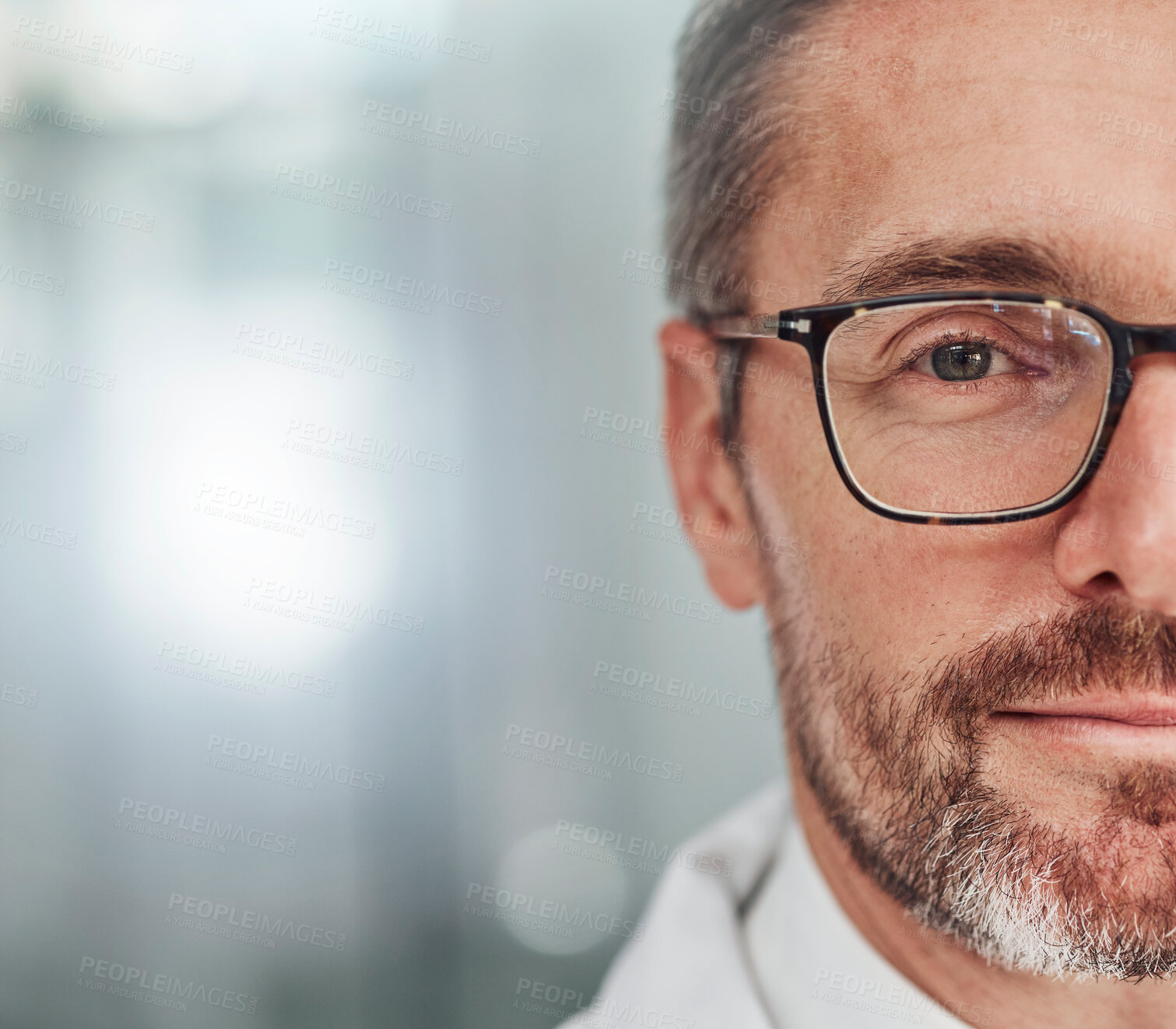 Buy stock photo Doctor, face and portrait smile for healthcare, vision or career ambition in life insurance on mockup. Closeup of happy male medical expert half smiling for medicare against a blurred background