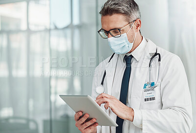 Buy stock photo Hospital, research and doctor with tablet and mask for wellness, medical care and patient data. Healthcare, insurance and senior man on digital tech for online consulting, report and telehealth app