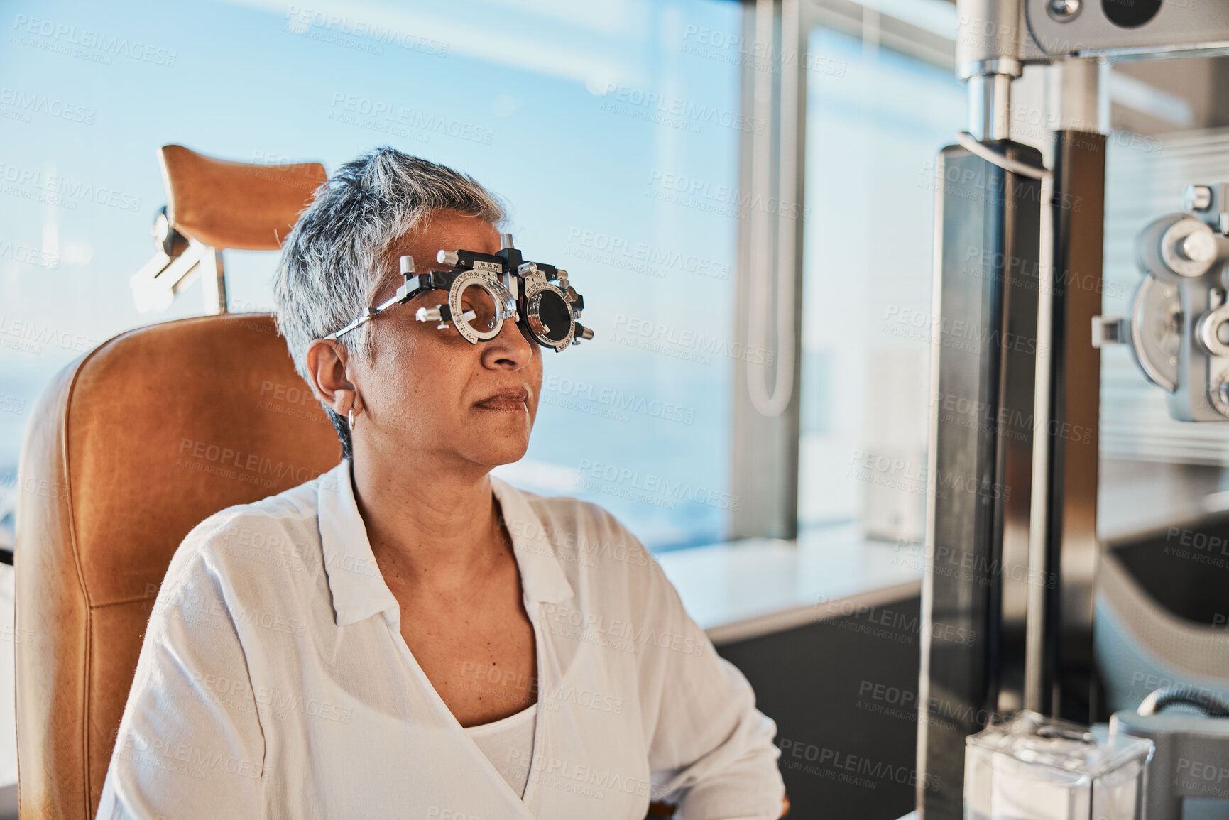 Buy stock photo Eye exam, frame and senior woman at optometrist for vision test, trial eyeglasses and optical assessment. Ophthalmology, optician clinic and female in consultation for retina, eyes and medical lens