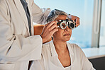 Senior eye exam, optometrist and medical eyes test of  elderly woman at doctor consultation. Vision, healthcare focus and old female patient with consulting wellness expert for lens and glasses check