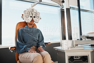 Buy stock photo Ophthalmologist phoropter, patient consulting or eye exam for vision, healthcare or wellness. Black woman, ophthalmology care and health for eyes in office, hospital or store for vision assessment