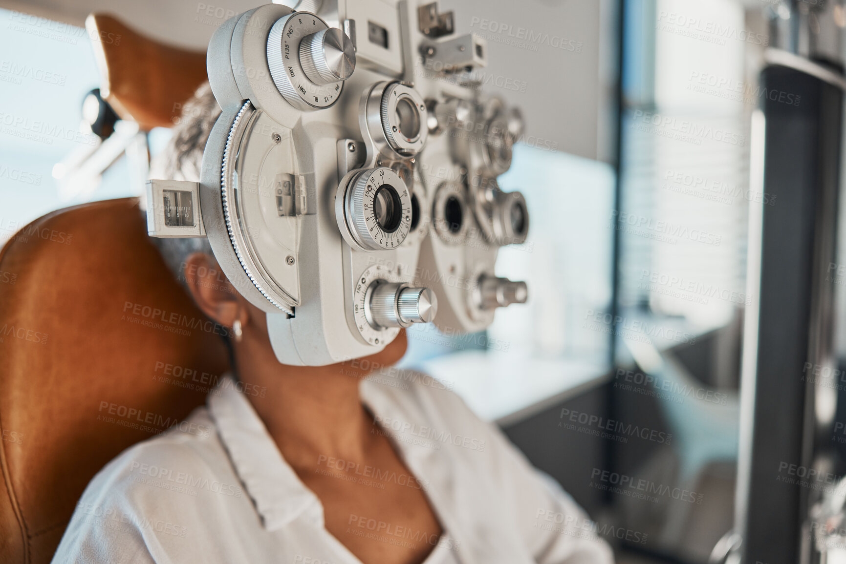 Buy stock photo Healthcare test, eye exam and woman in optometry clinic for vision, eyesight and optical assessment. Glasses, optometrist consultation and patient with medical equipment, phoropter and lens for eyes