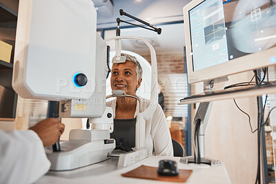 Buy stock photo Machine, senior woman and test eyes in office, optometry and healthcare for vision, smile and conversation. Optometrist, mature female customer and client with eye care, research and appointment