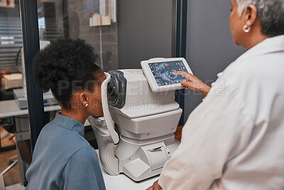 Buy stock photo Digital eye test, vision and health for eyes, optometry and doctor with patient, eyecare and ophthalmology clinic. Machine, screen and black woman with senior optometrist, service and medical exam