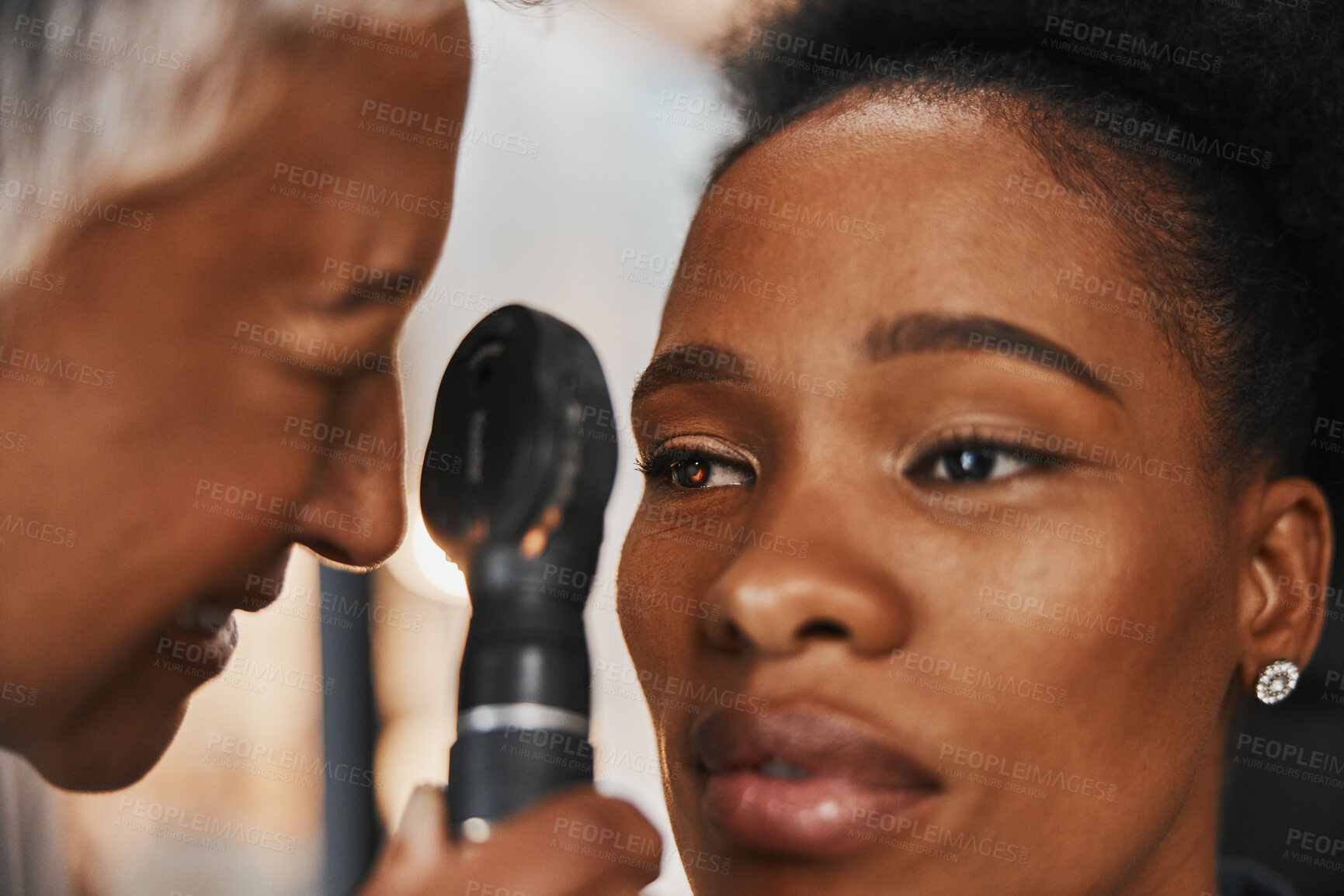 Buy stock photo Doctor, face or black woman in eye exam assessment consultation for eyesight at optometrist office. Zoom of optician helping a mature customer testing or checking vision, iris or retina visual health