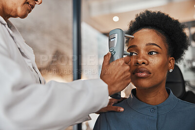 Buy stock photo Face, eye exam or black woman consulting doctor for eyesight at optometrist or ophthalmologist. African customer testing vision with hands of optician helping or testing iris or retina visual health 