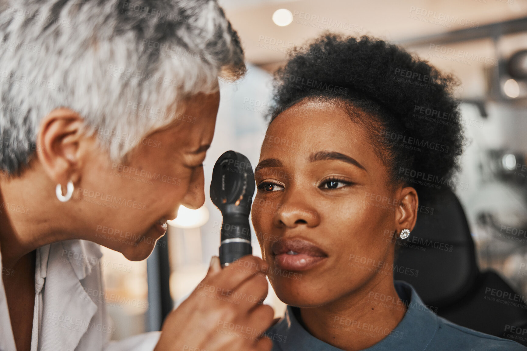 Buy stock photo Laser, senior doctor or black woman in eye exam for eyesight at optometrist office. Mature optician helping an African customer or client testing or checking vision, iris or retina visual health 