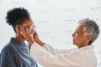 Buy stock photo Optician, vision and black woman shopping for glasses in optometry store or shop for ophthalmology. Doctor, healthcare and female or senior medical ophthalmologist with eyewear or lenses for eye care