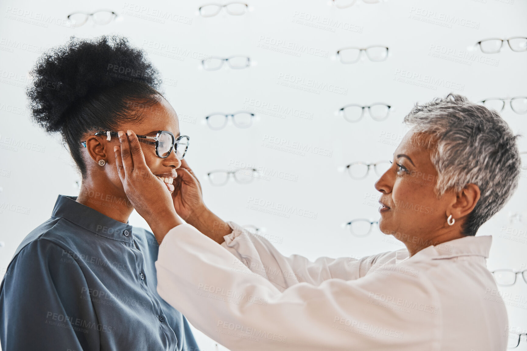 Buy stock photo Optician, vision and black woman shopping for glasses in optometry store or shop for ophthalmology. Doctor, healthcare and female or senior medical ophthalmologist with eyewear or lenses for eye care