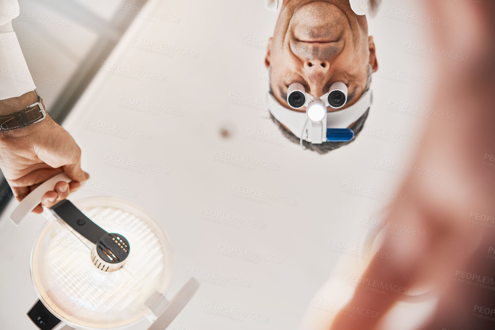 Buy stock photo Eye exam, flashlight and face of optometrist looking down to patient for vision test, eyesight and optical exam Ophthalmology, clinic and man in consultation for retina, eyes and medical surgery