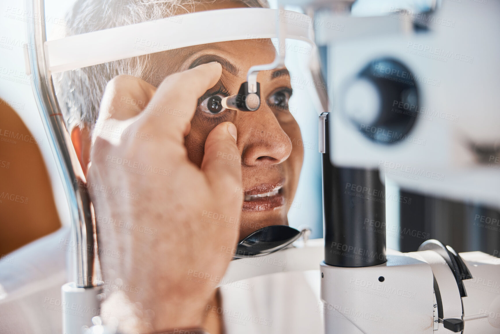 Buy stock photo Senior eye zoom, retina check and medical eyes test of elderly woman at doctor consultation. Vision, healthcare focus and old female patient with consulting wellness expert for lens and glaucoma exam