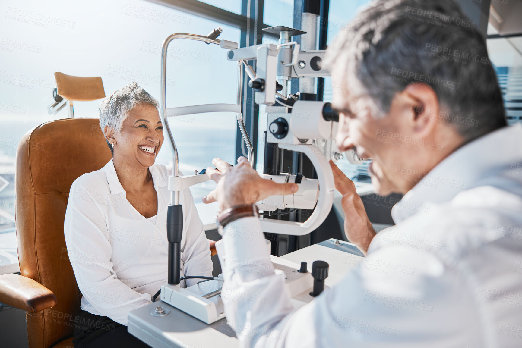 Buy stock photo Eye doctor, machine or happy woman consulting for help with eyesight at optometrist in an optical assessment. Optician talking or asking senior customer info testing for vision, iris or retina health