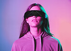 Vr, metaverse and woman in 3d virtual reality isolated on a background in studio. Futuristic neon, face technology and female with cyber glasses for online gaming, internet browsing or simulation.