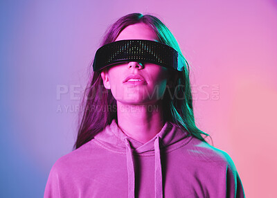 Buy stock photo Vr, metaverse and woman in 3d virtual reality isolated on a background in studio. Futuristic neon, face technology and female with cyber glasses for online gaming, internet browsing or simulation.