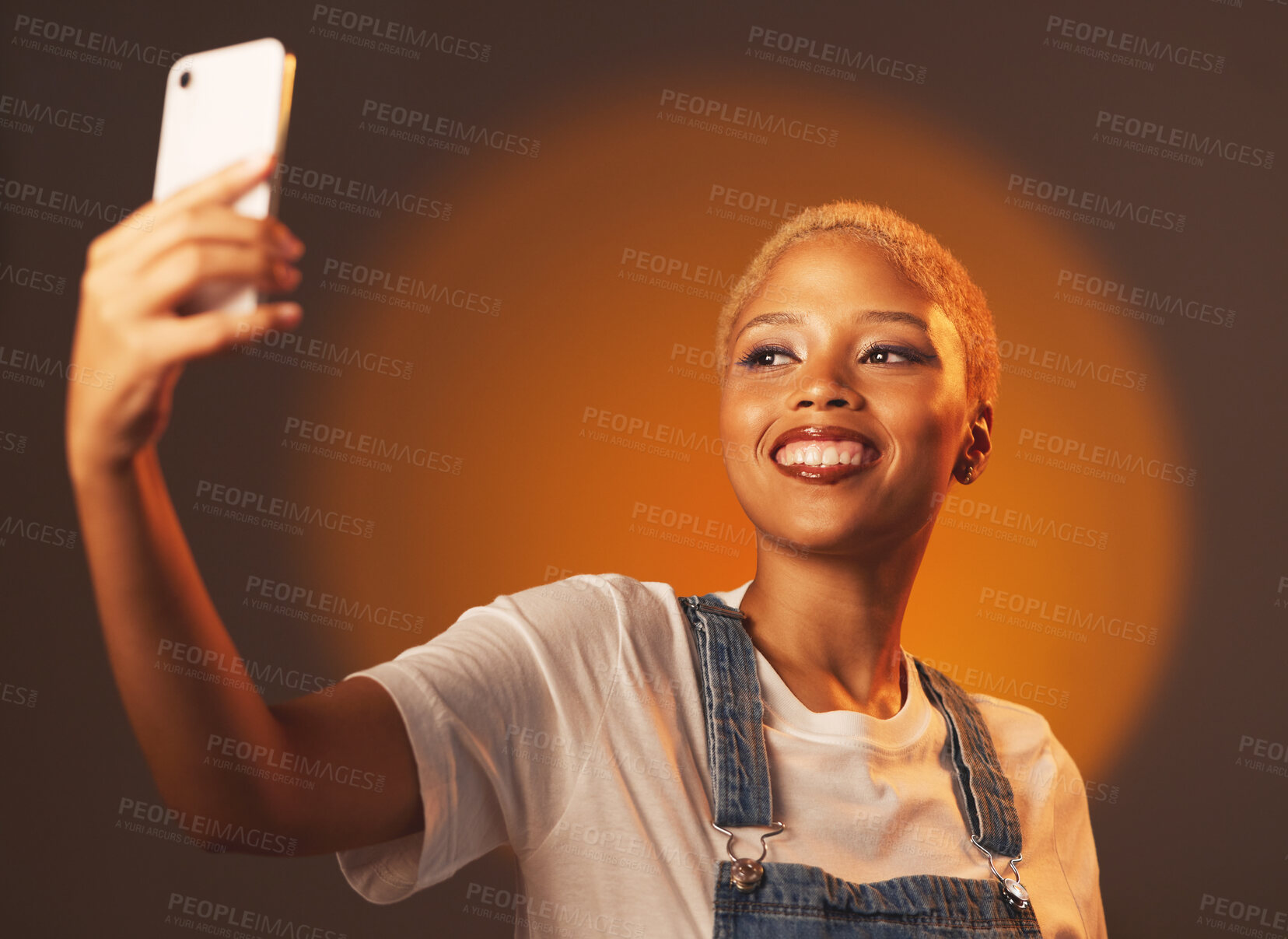 Buy stock photo Beauty, selfie and black woman in studio for makeup, fun and spotlight aesthetic on gradient background. Social media, girl and fashion influencer smile for blog, profile picture or homepage update