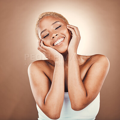 Buy stock photo Black woman, hands on face and beauty smile on a brown background for dermatology cosmetics. Happy aesthetic model person in studio for skincare, self care and facial glow with clean and healthy skin