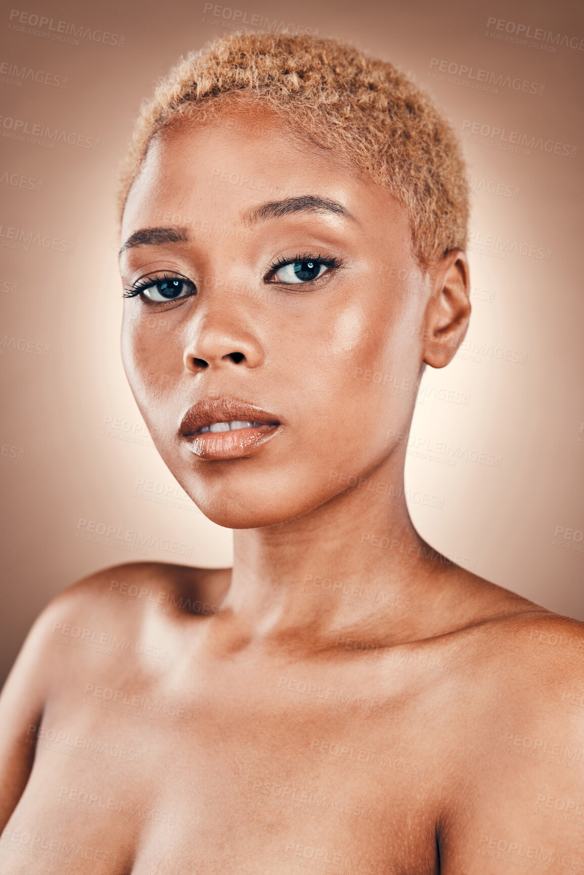 Buy stock photo Beauty, skincare and portrait of black woman with glowing skin in studio on brown background. Natural makeup, spa facial promotion and advertising luxury cosmetics on model face with golden shine.