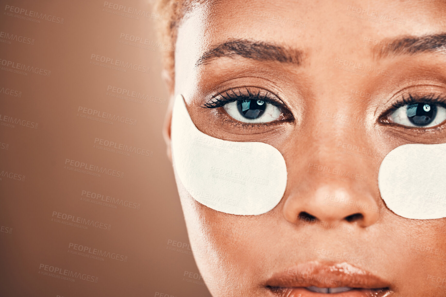 Buy stock photo Eye patch, black woman and portrait for beauty on a mockup background for collagen dermatology. Aesthetic model person face in studio for skincare, cosmetics and facial skin glow with gel mask space
