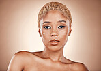 Beauty, skincare and portrait of black woman with cream on face in studio with mockup, luxury cosmetics and glowing skin. Natural makeup, spa facial and golden aesthetic on model on brown background.