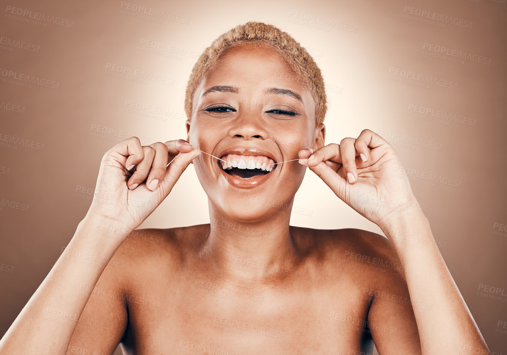 Buy stock photo Black woman, flossing teeth and dental care portrait on a brown background for healthy smile. Laughing model person in studio for self care, cleaning mouth and funny hygiene for health and wellness