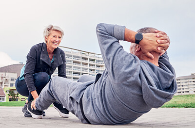 Buy stock photo Exercise, health and sit ups with a senior couple training outdoor together for an active lifestyle of training. Workout, fitness or core with a mature man and woman outside on the promenade