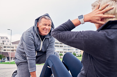 Buy stock photo Fitness, workout and sit ups with a senior couple training outdoor together for an active lifestyle of wellness. Health, exercise or core with a mature man and woman outside on the promenade