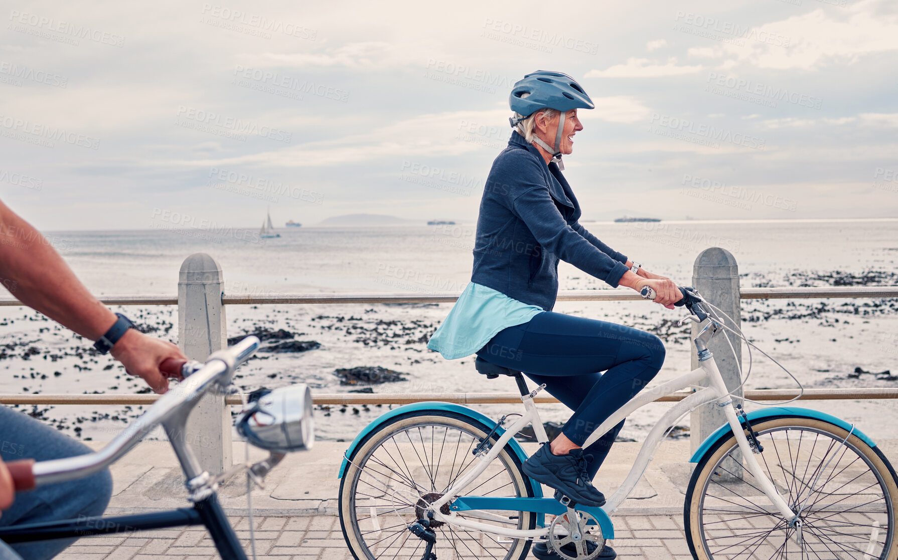 Buy stock photo Old woman on bike at beach, fitness and cycling outdoor, vitality and health, retirement activity by ocean. Cyclist, bicycle and sustainable transport, eco friendly and carbon footprint with hobby