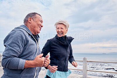 Buy stock photo Running, fitness and senior couple laugh by ocean for exercise, healthy body and wellness in retirement. Sports, marriage and happy elderly man and woman for smile, cardio workout and training by sea