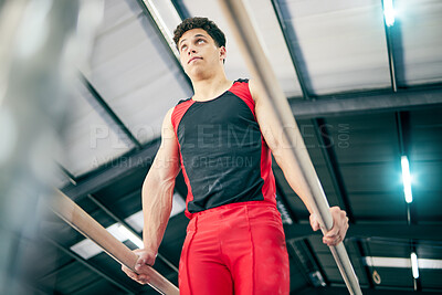 Buy stock photo Gymnastics, fitness and man training in a studio for a competition, performance or show. Sports, athlete and male gymnast practicing for flexibility, agility or strength for balance at event in arena