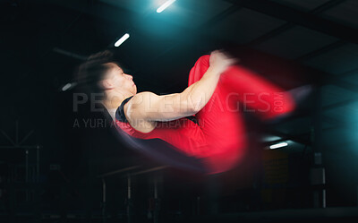 Buy stock photo Training, gymnastics and jump with man in stadium for sports, speed and motion blur. Workout, action and challenge with flexible athlete in gym arena for performance, exercise and fitness health