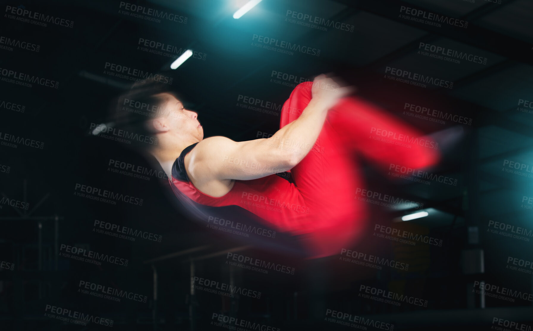 Buy stock photo Training, gymnastics and jump with man in stadium for sports, speed and motion blur. Workout, action and challenge with flexible athlete in gym arena for performance, exercise and fitness health