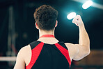 Fitness, back and man with success, fist and celebration for competition, workout goals and target. Male athlete, gymnast or winner with gesture for victory, energy or sports motivation with wellness